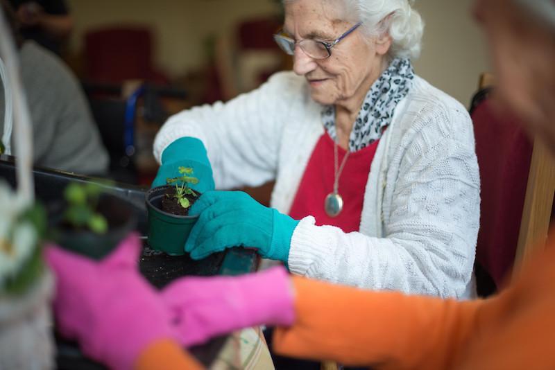 Colten Care resident gardening