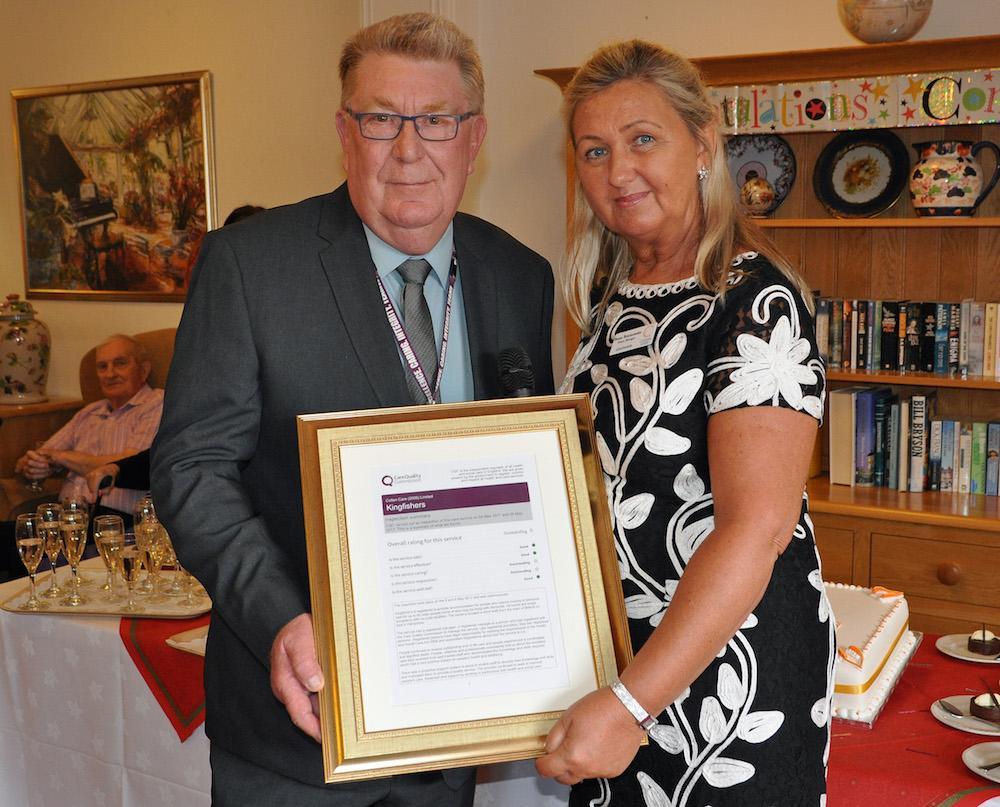 Tony Smith, Inspector, Care Quality Commission, presents the Outstanding certificate to Beata Brzozowska, Home Manager at Colten Care's Kingfishers home in New Milton.
