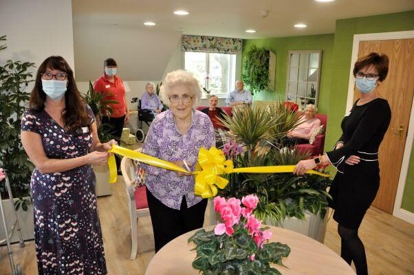 ribbon cutting of botanical interior Belmore Lodge